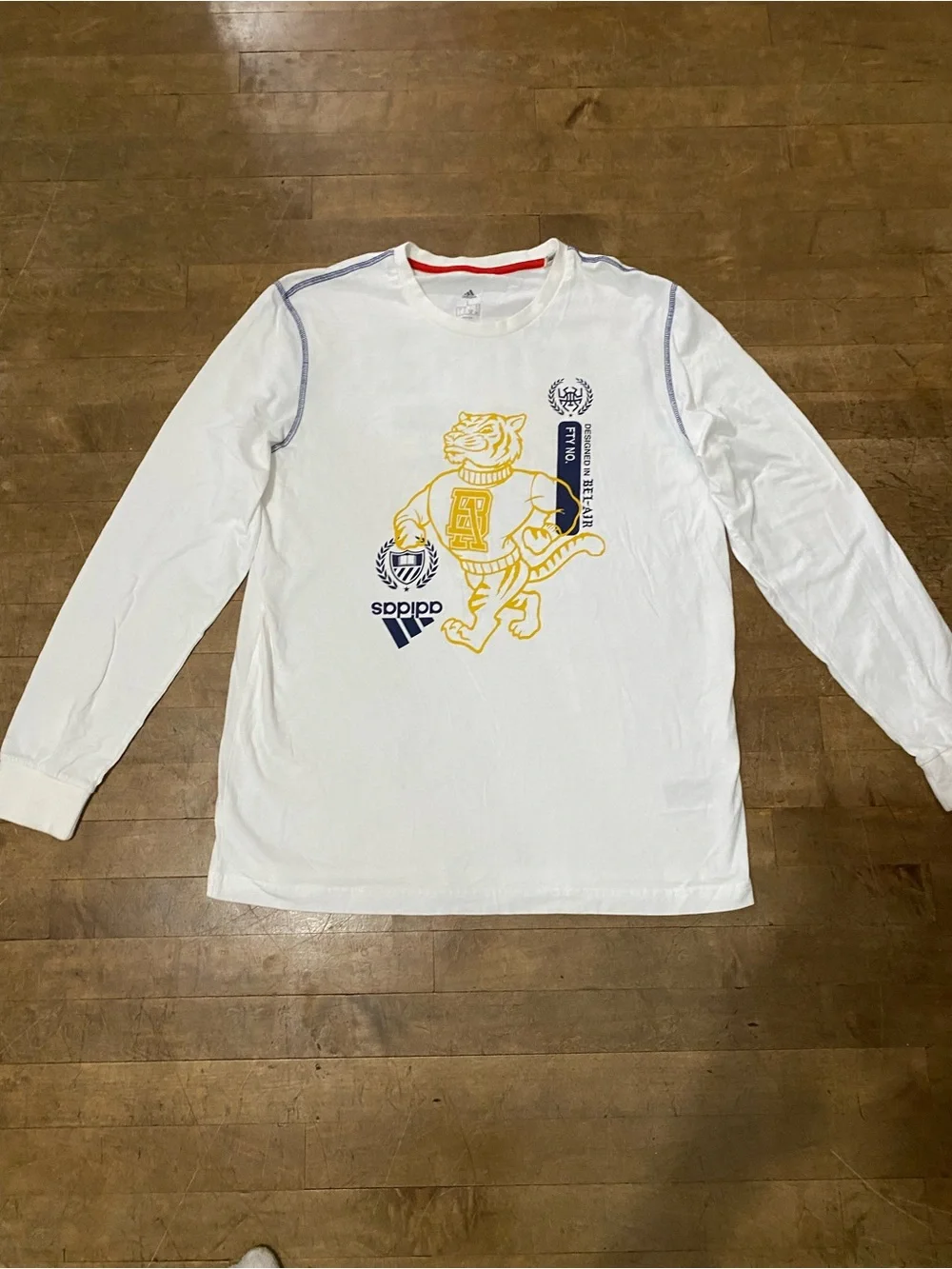 adidas White Long-Sleeve Tee with Yellow Tiger Graphic and Navy Accents